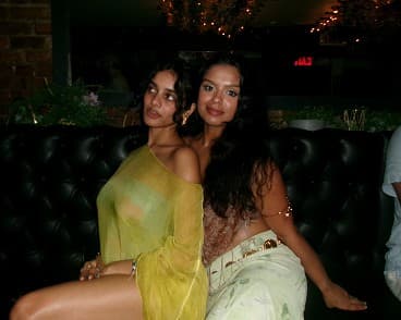 Two Lychee founders seated together